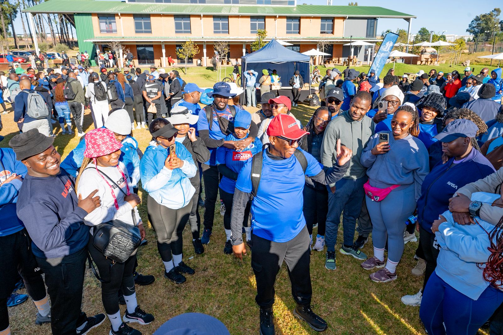 Couples Hiking Events members gathered together outside the lodge